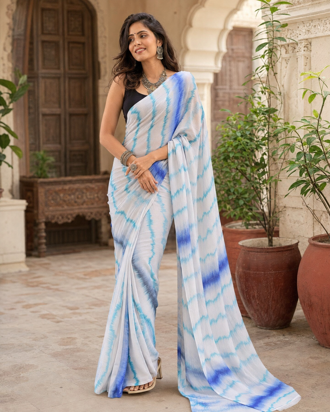 Soft Georgette Sibori Print Saree With Unstitched Blouse(Blue)