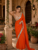 Load image into Gallery viewer, Rangoli Silk Mirror Work Lace Border Saree With Unstitched Blouse(Orange)

